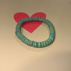 Hand made clay bead bracelet, In a color pattern mint green and light green.